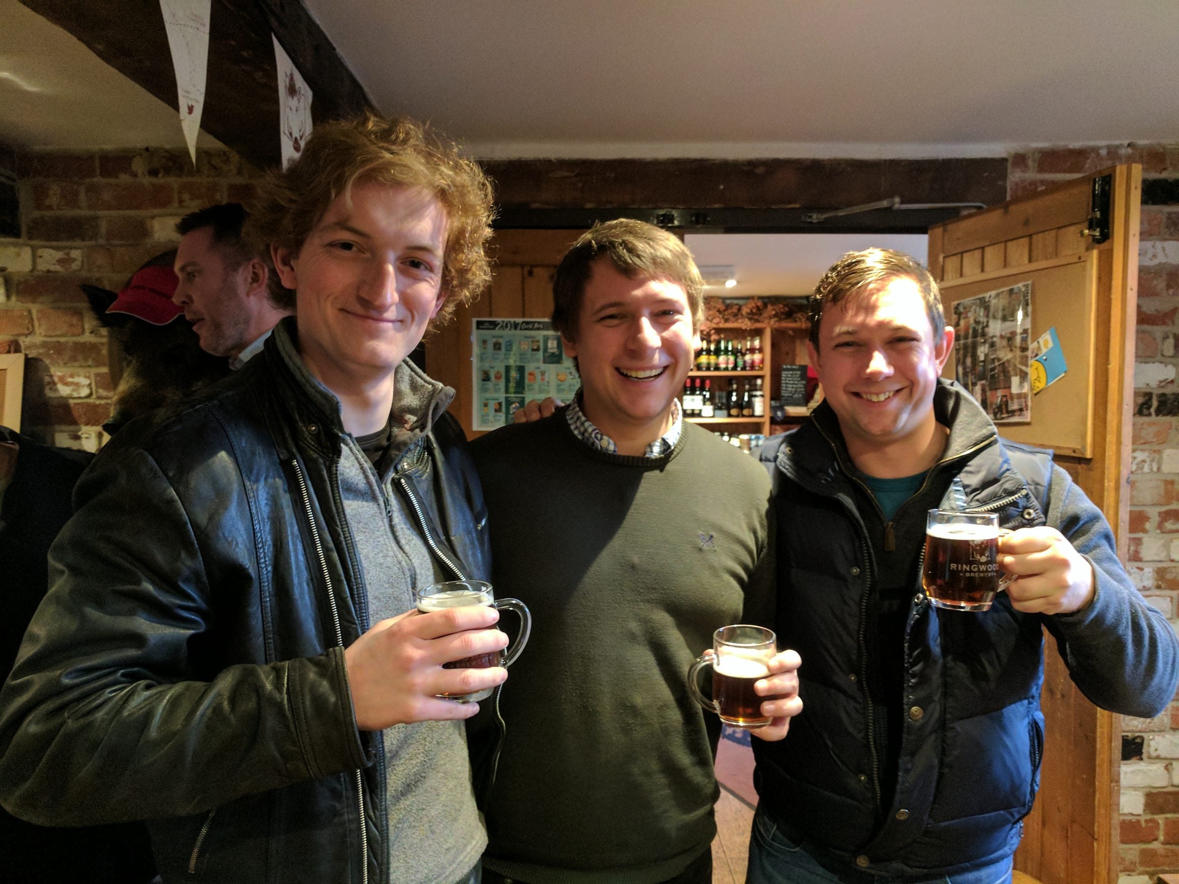 Tom, Lawrence and Harry sharing a beer in the early days